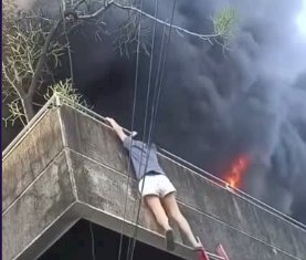 HEROÍNA FILIPINA SALVA CÃES DE INCÊNDIO AO ARREMESSÁ-LOS DO TERCEIRO ANDAR